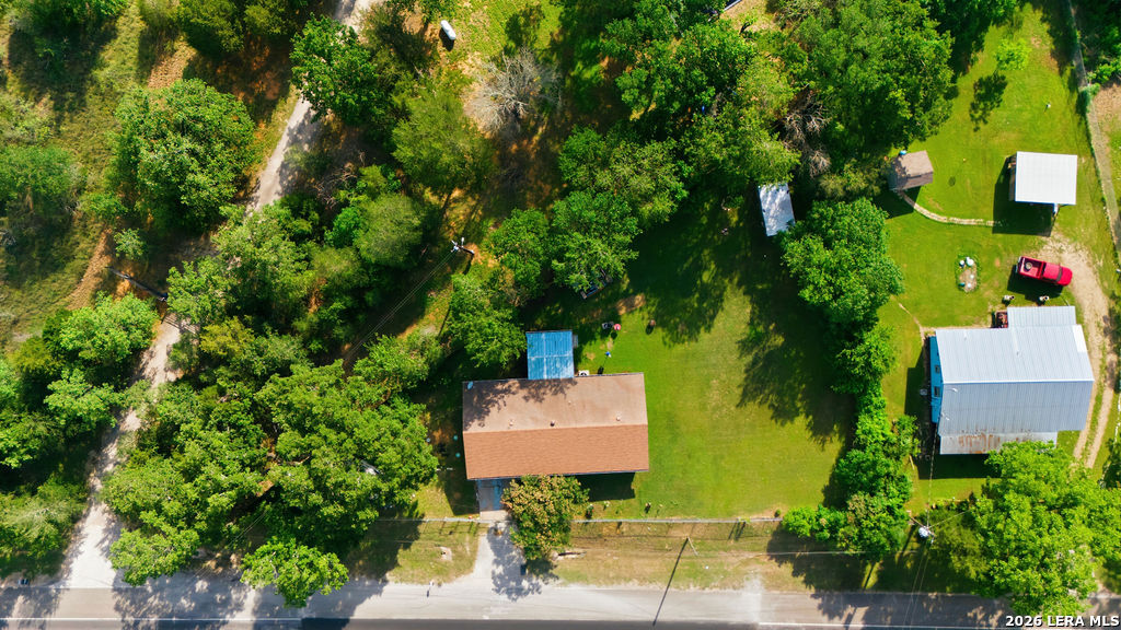 365 State Highway 95 Elgin, TX 78621 - Photo 30 of 34 an aerial view of a house with a yard and garden