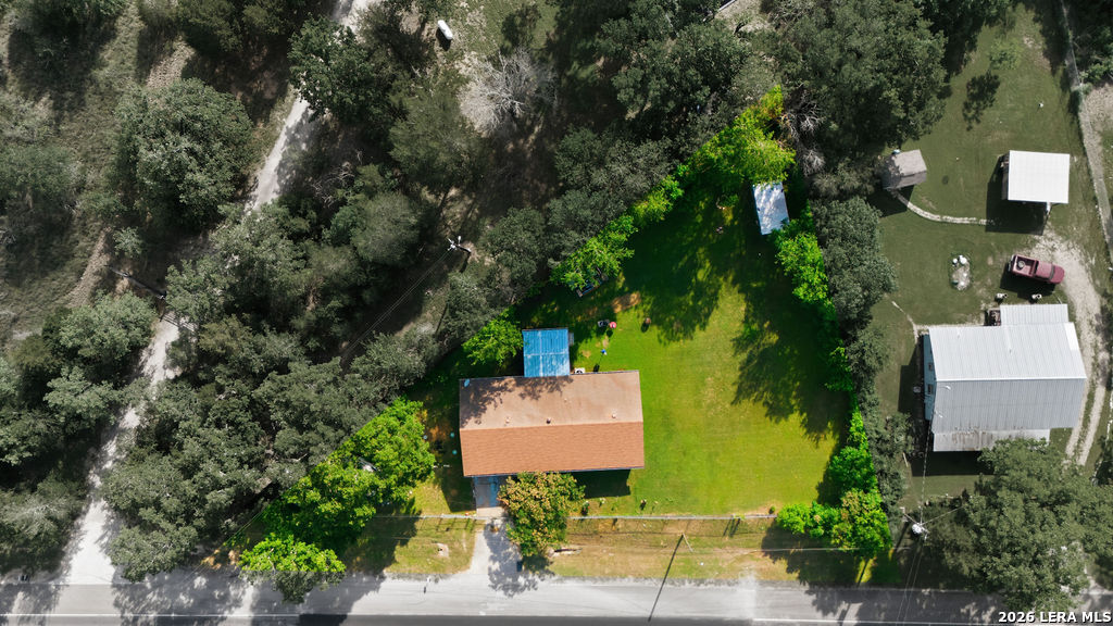 365 State Highway 95 Elgin, TX 78621 - Photo 31 of 34 an aerial view of a house with a yard and garden