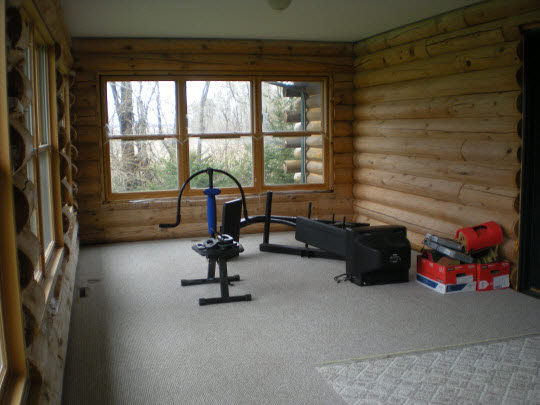 8470 Friday Road Davis Junction, IL 61020 - Photo 8 of 11 a view of a room with gym equipment