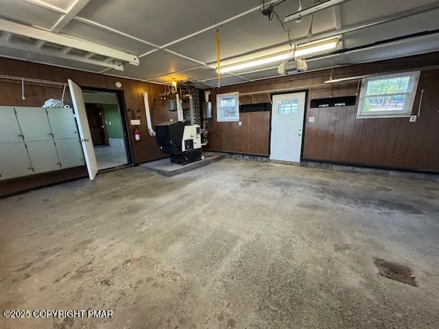 a view of a backyard with a chair and table