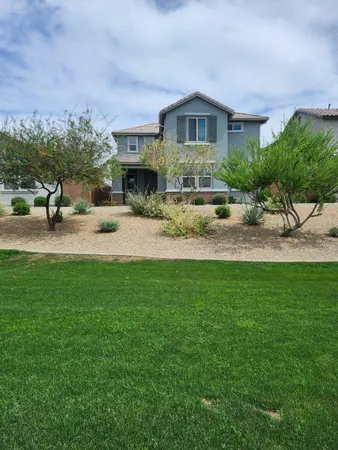 a view of a house with a patio