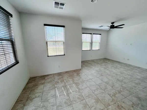 an empty room with windows