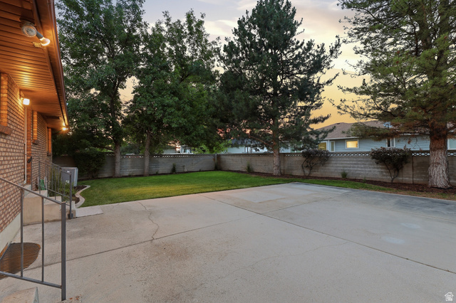 1649 Success Lane Sandy, UT 84092 - Photo 33 of 36 Backyard With Patio Area