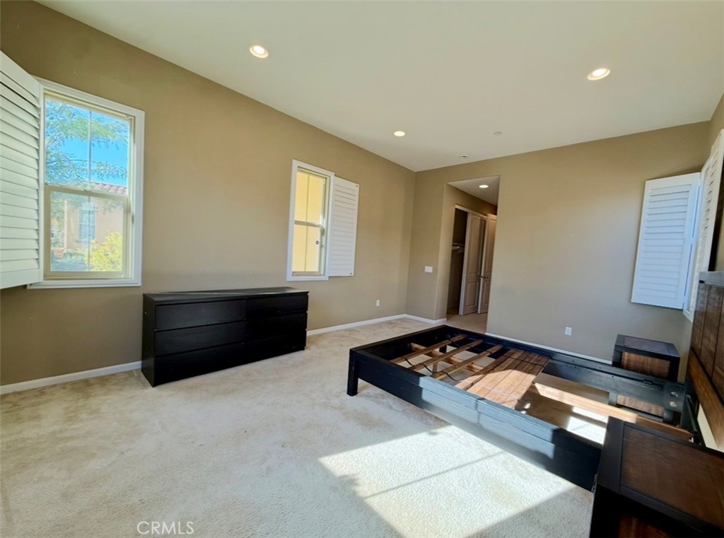 667 Desert Willow Road Azusa, CA 91702 - Photo 12 of 75 a bedroom with a bed and a window