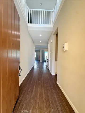 a view of a kitchen with a sink and a stove top oven
