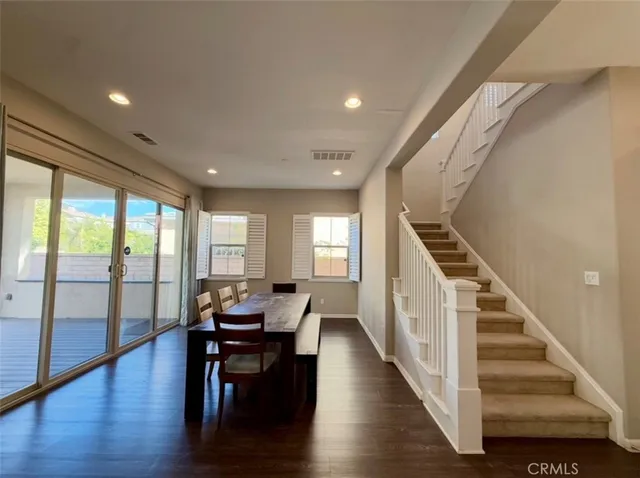 a kitchen with a stove a sink and a refrigerator