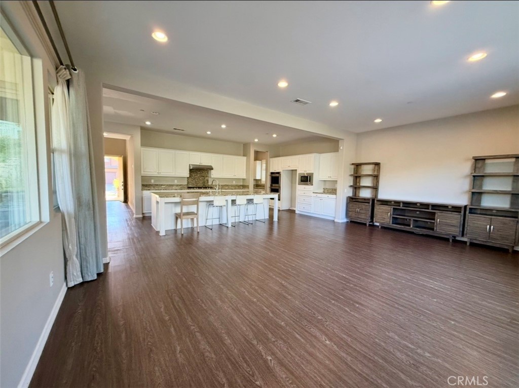 667 Desert Willow Road Azusa, CA 91702 - Photo 44 of 75 a view of a kitchen with furniture and wooden floor
