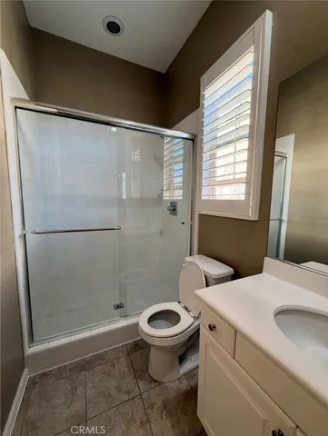 a living room with furniture rug and window