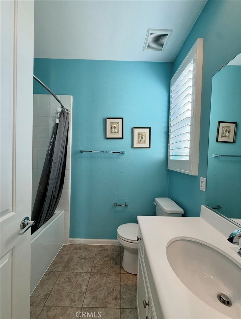 667 Desert Willow Road Azusa, CA 91702 - Photo 58 of 75 a bathroom with a sink and toilet
