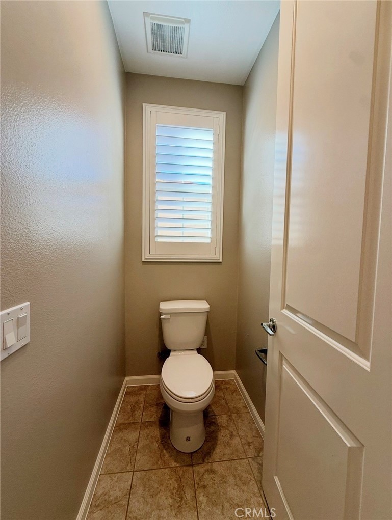667 Desert Willow Road Azusa, CA 91702 - Photo 70 of 75 a bathroom with a toilet