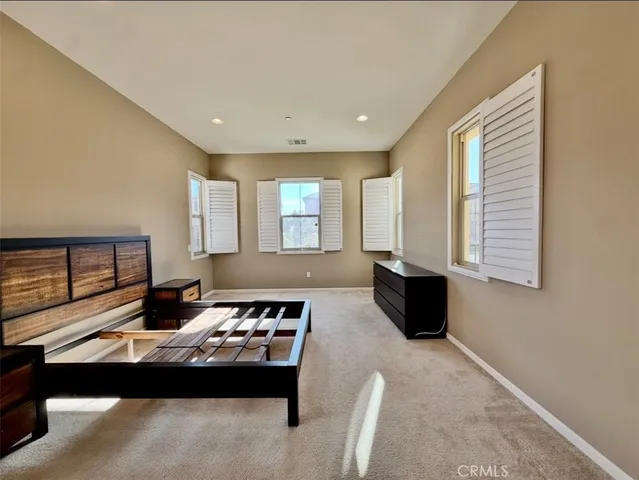 a view of gallery with wooden floor