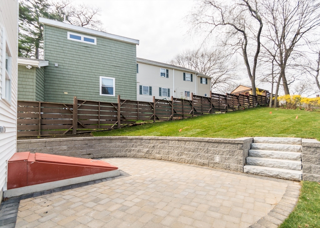 89 Hardy Pond Road Waltham, MA 02451 - Photo 39 of 39 a view of a house with a yard