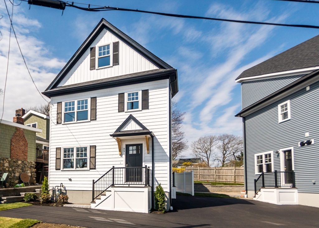 89 Hardy Pond Road Waltham, MA 02451 - Photo 4 of 39 a view of a house with a street