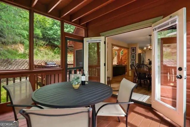 a view of a two chairs in the deck