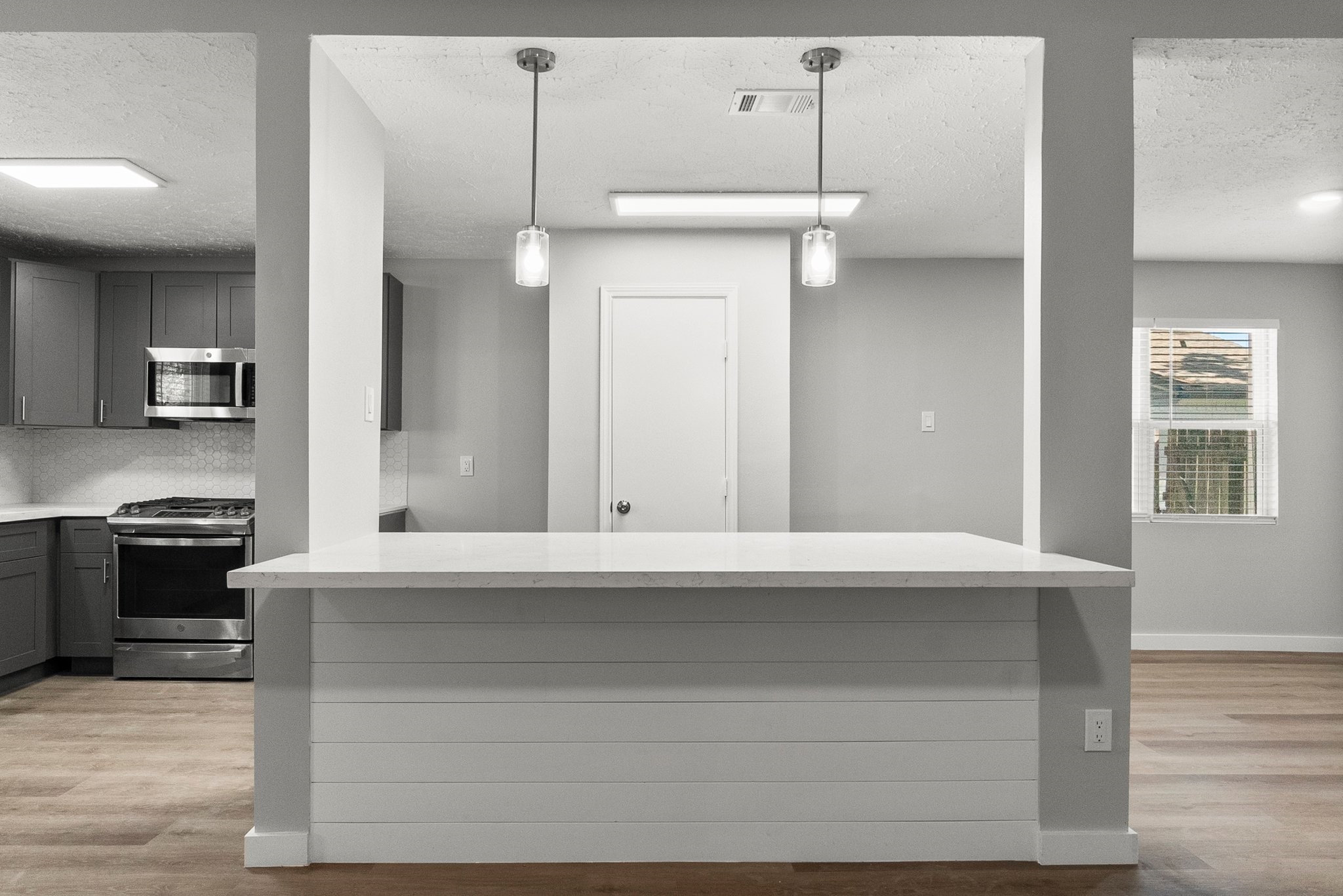 22907 Lemon Grove Drive Spring, TX 77373 - Photo 14 of 30 a kitchen with a refrigerator and a stove