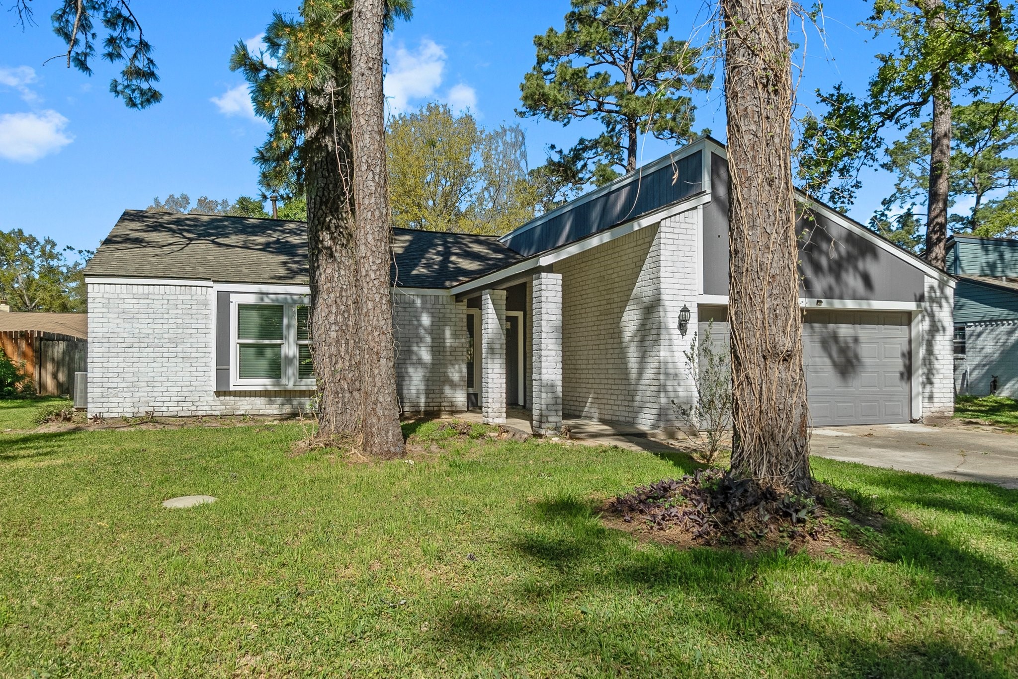 22907 Lemon Grove Drive Spring, TX 77373 - Photo 2 of 30 a view of a house with backyard and garden