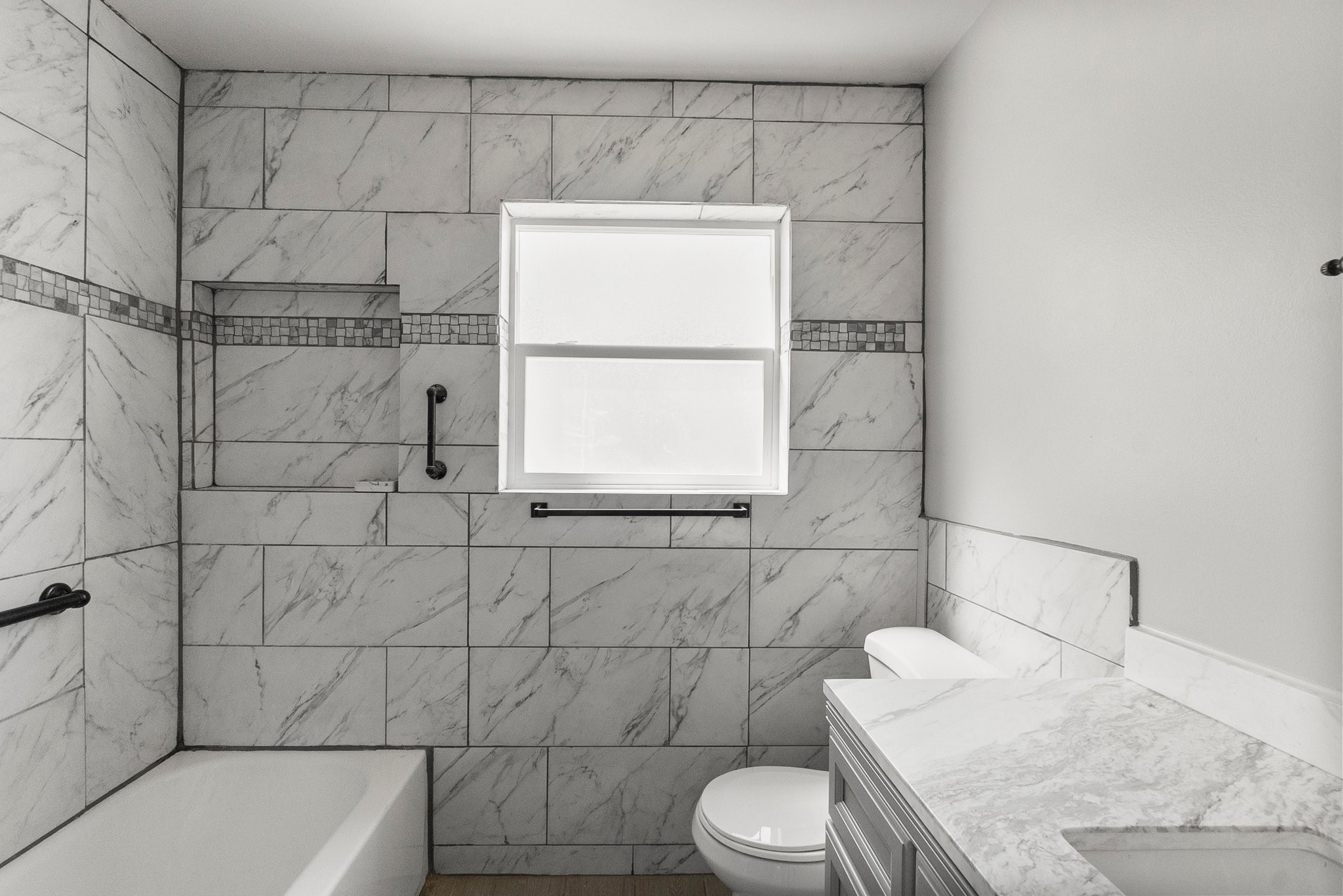 22907 Lemon Grove Drive Spring, TX 77373 - Photo 26 of 30 a bathroom with a sink a toilet and shower