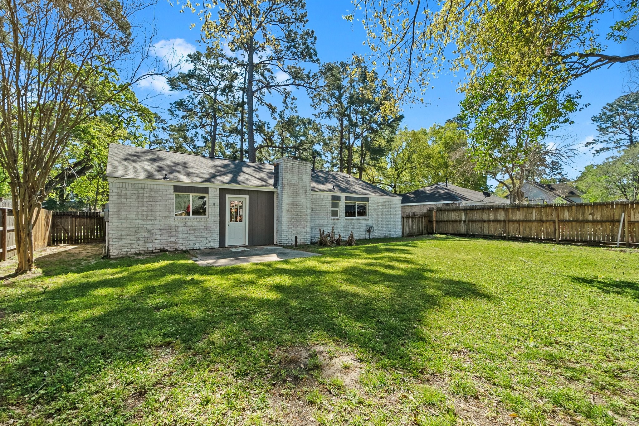 22907 Lemon Grove Drive Spring, TX 77373 - Photo 28 of 30 a front view of house with yard and green space