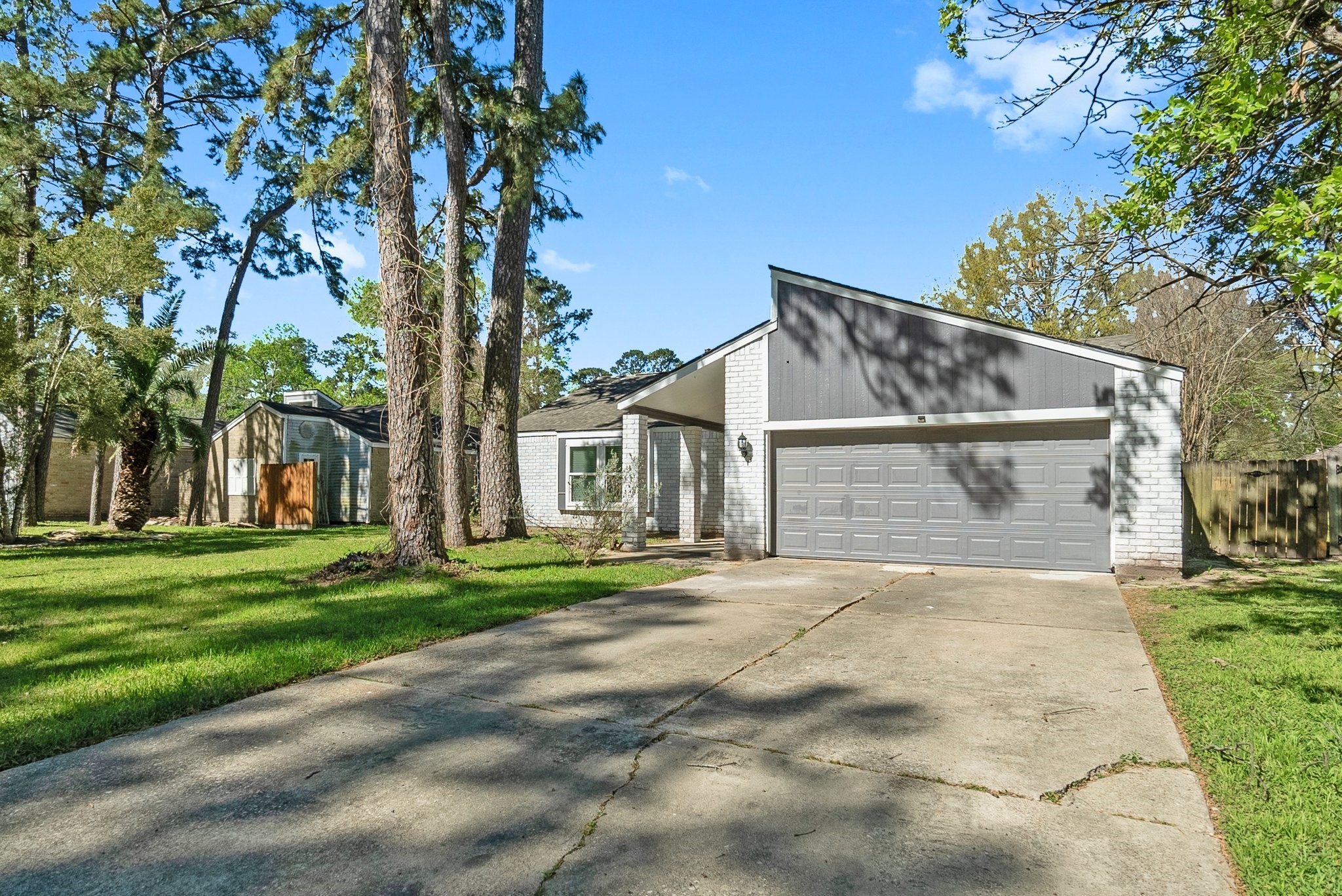 22907 Lemon Grove Drive Spring, TX 77373 - Photo 3 of 30 a view of a house with a yard