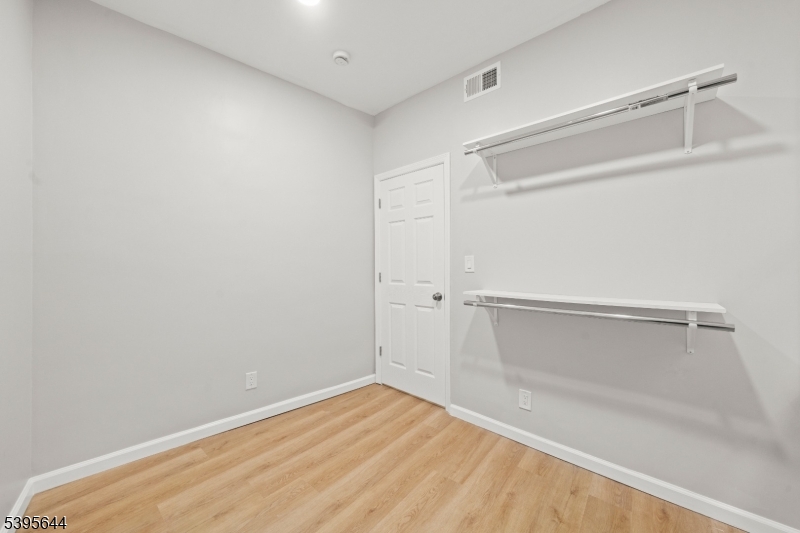 57 Henry Street, Unit A1 Passaic, NJ 07055 - Photo 11 of 14 a view of an empty room