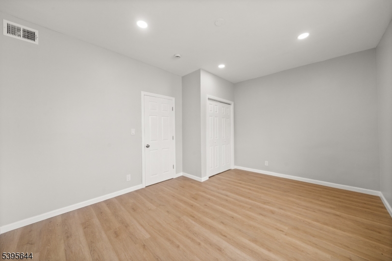 57 Henry Street, Unit A1 Passaic, NJ 07055 - Photo 5 of 14 a view of empty room