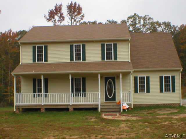 a view of a house with roof deck