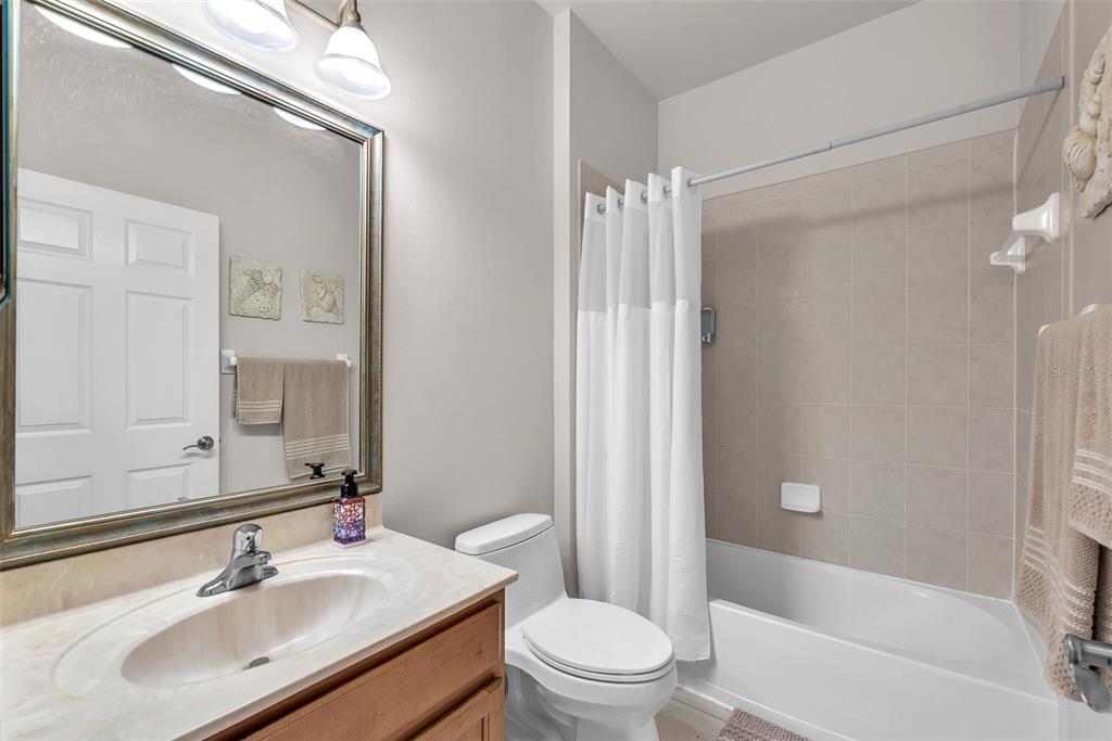 321 Silver Falls Drive Apollo Beach, FL 33572 - Photo 23 of 51 a bathroom with a sink toilet and shower