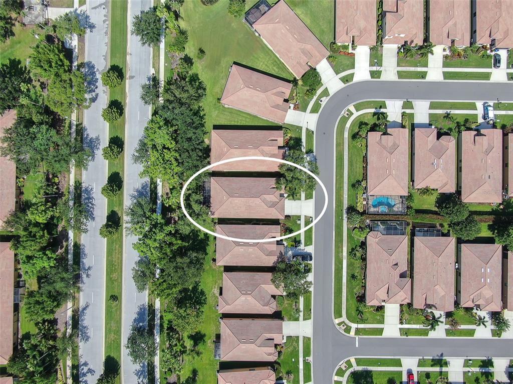 321 Silver Falls Drive Apollo Beach, FL 33572 - Photo 27 of 51 an aerial view of a building with garden space and street view