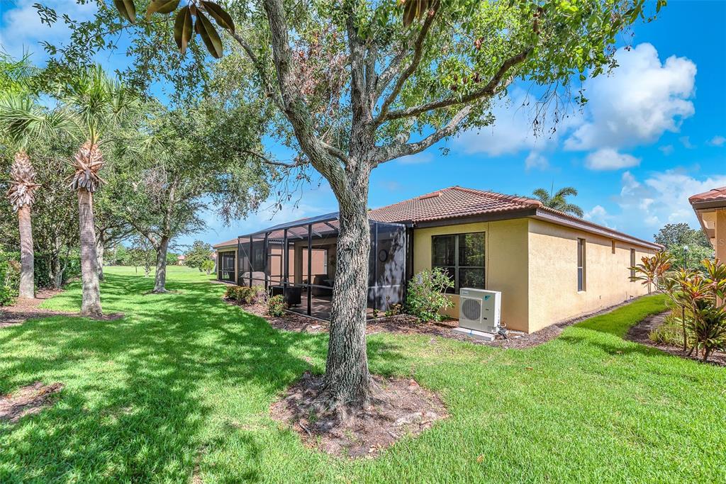 321 Silver Falls Drive Apollo Beach, FL 33572 - Photo 3 of 51 a front view of a house with garden