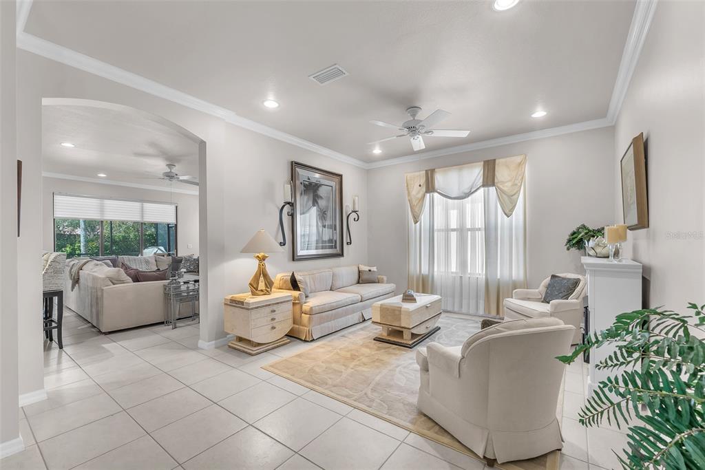 321 Silver Falls Drive Apollo Beach, FL 33572 - Photo 9 of 51 a living room with furniture and a large window