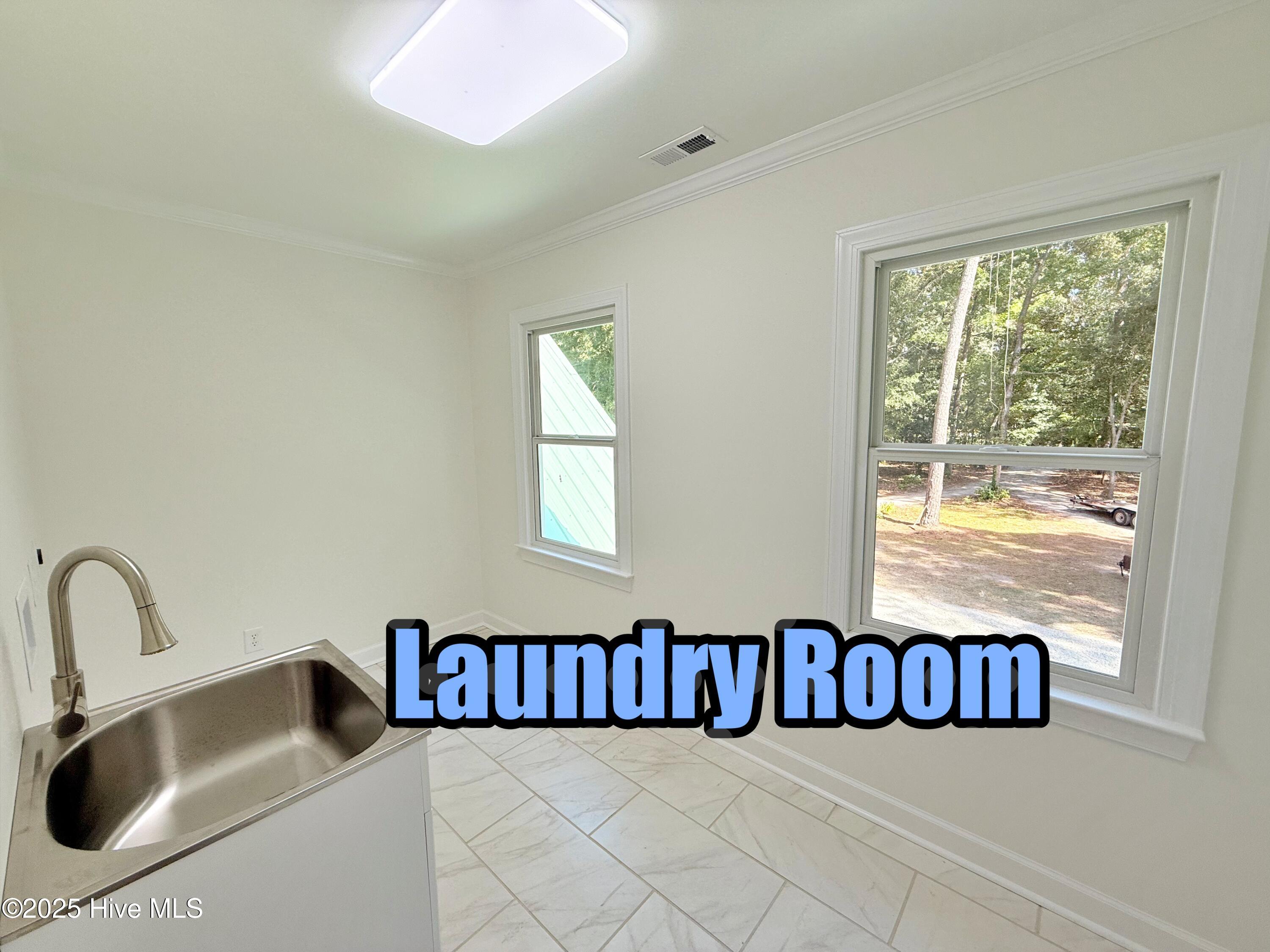 273 West Rock Creek Road New Bern, NC 28562 - Photo 38 of 43 laundry room