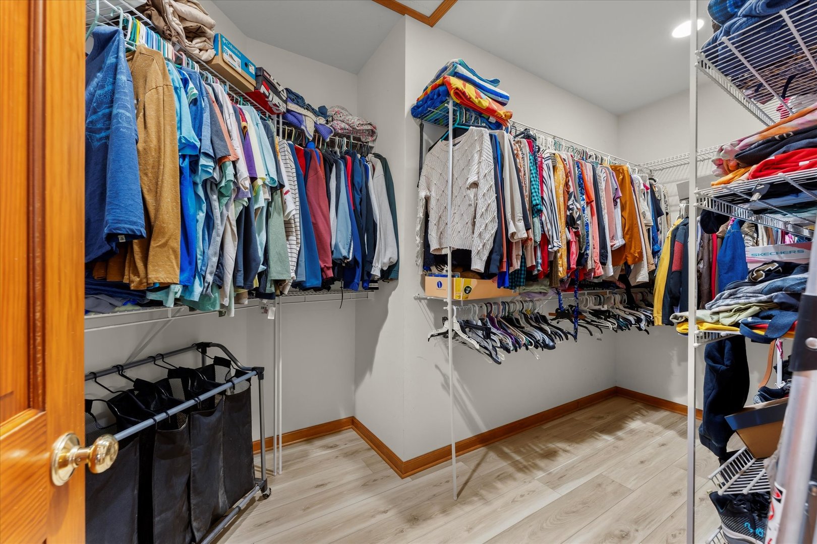 1376 East 2950 North Road Mansfield, IL 61854 - Photo 28 of 44 a view of walk in closet with clothes and shoes
