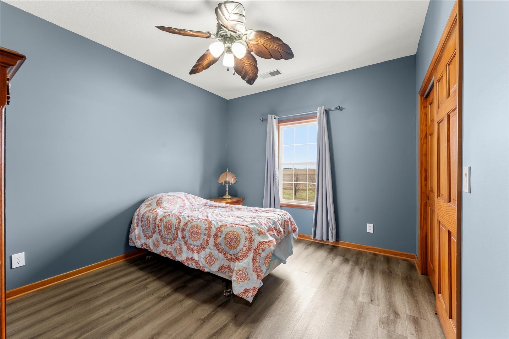 1376 East 2950 North Road Mansfield, IL 61854 - Photo 29 of 44 a bedroom with a bed and a window