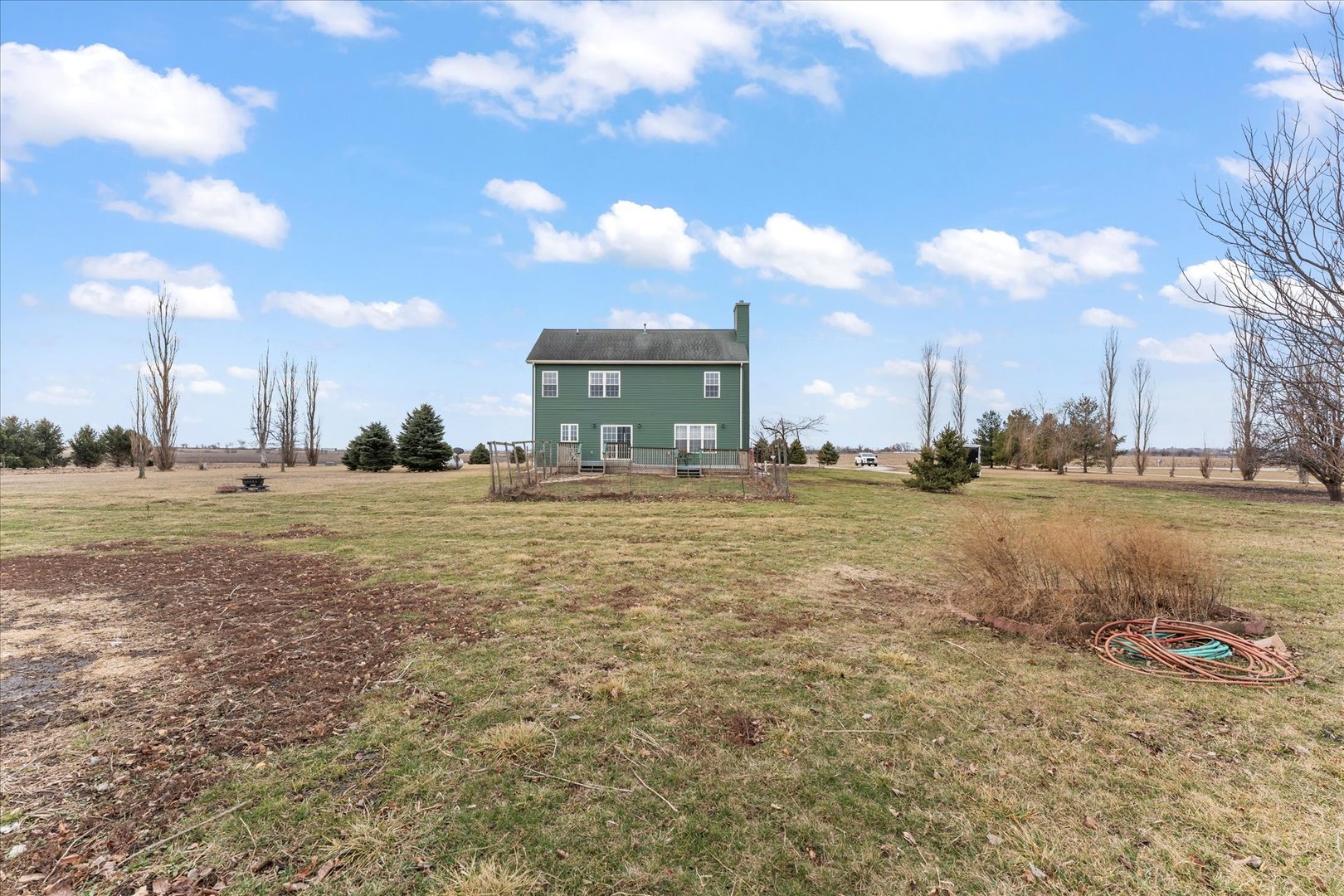 1376 East 2950 North Road Mansfield, IL 61854 - Photo 40 of 44 a view of a town with floor to ceiling windows