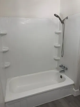 a bathroom with a sink and a window
