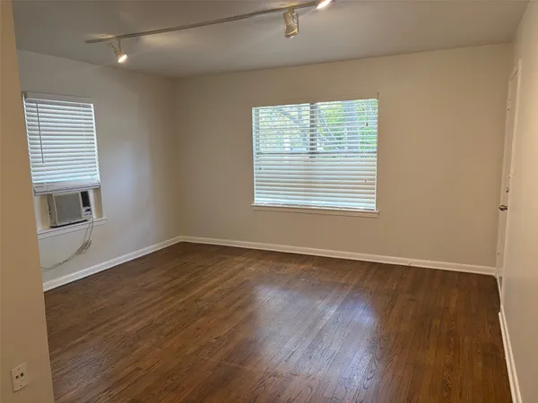 a picture of a bench in a white building