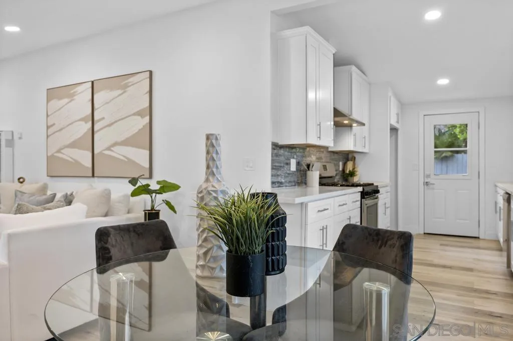 13746 Frame Road Poway, CA 92064 - Photo 17 of 35 a living room with furniture a flat screen tv and a large window