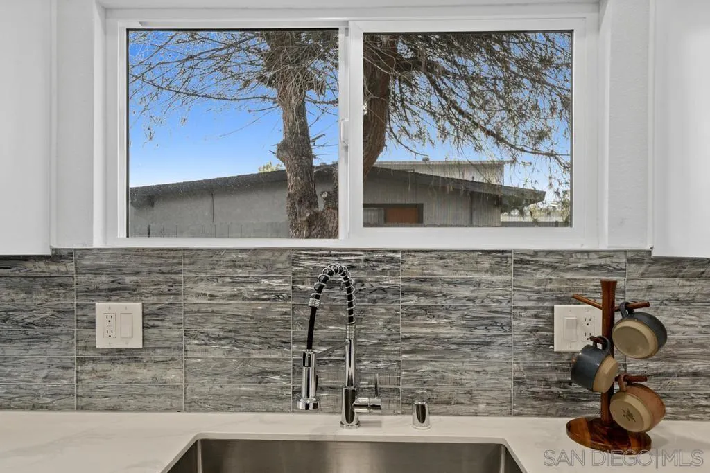 13746 Frame Road Poway, CA 92064 - Photo 20 of 35 a bathroom with a sink and a mirror