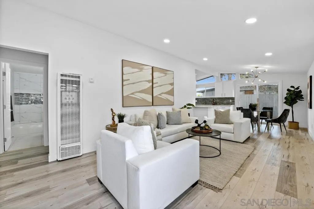 13746 Frame Road Poway, CA 92064 - Photo 2 of 35 a living room with furniture and a wooden floor