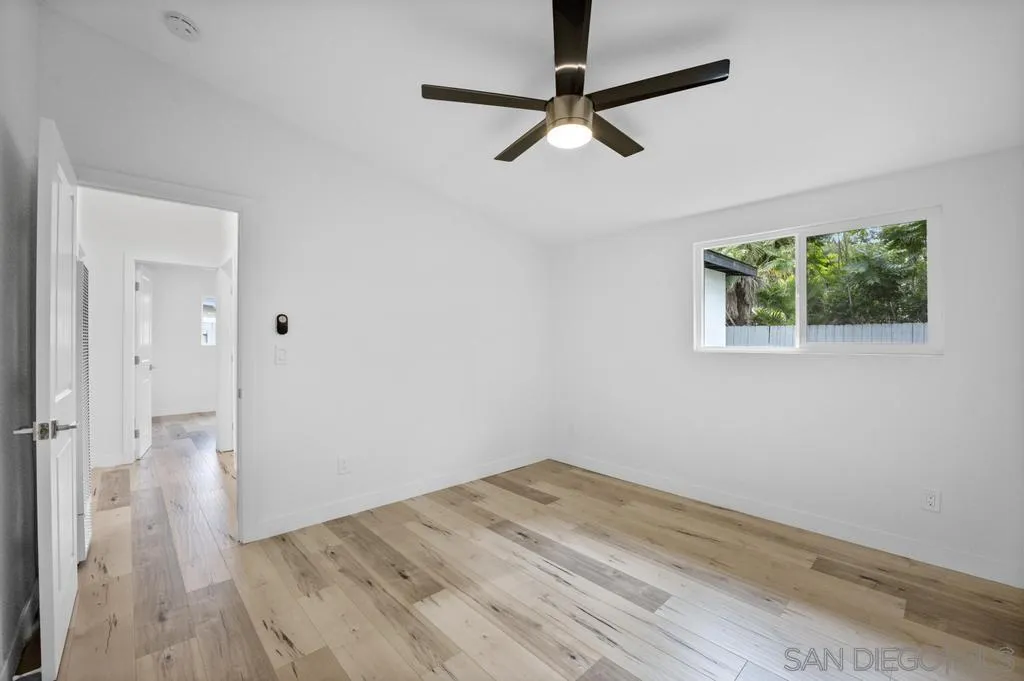 13746 Frame Road Poway, CA 92064 - Photo 23 of 35 wooden floor in an empty room with a window