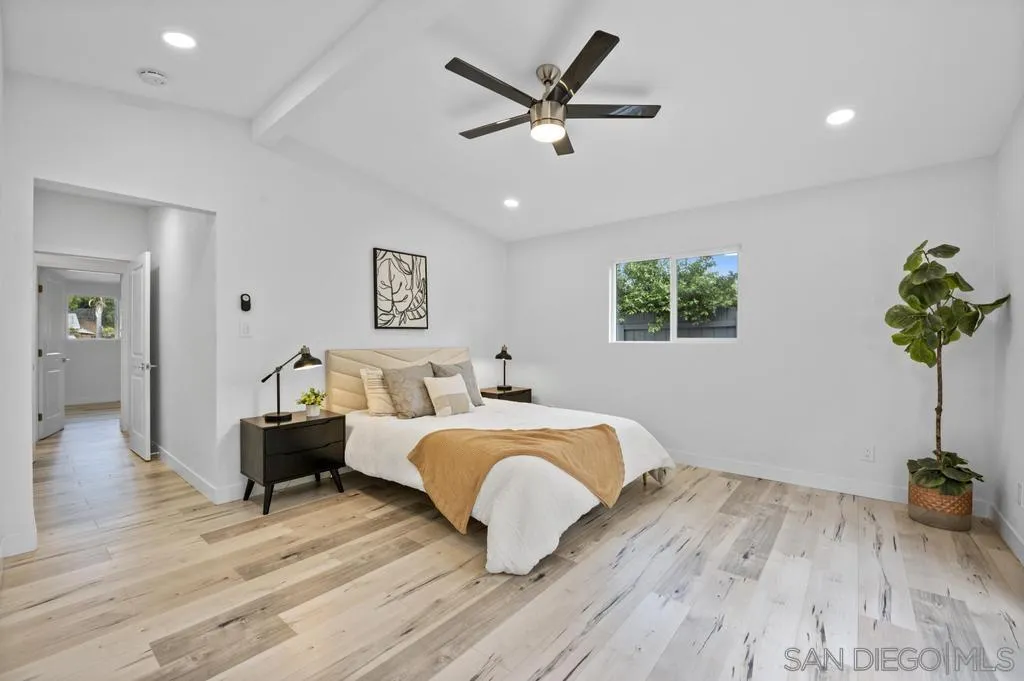 13746 Frame Road Poway, CA 92064 - Photo 27 of 35 a bed room with bed and a potted plant