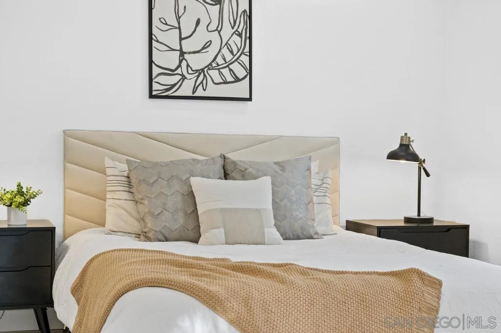 13746 Frame Road Poway, CA 92064 - Photo 28 of 35 a bedroom with a bed and a table