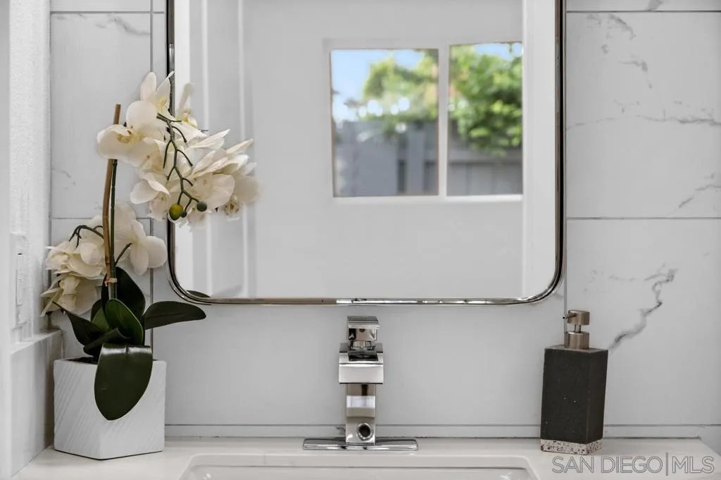 13746 Frame Road Poway, CA 92064 - Photo 30 of 35 a vase of flowers sitting on a table