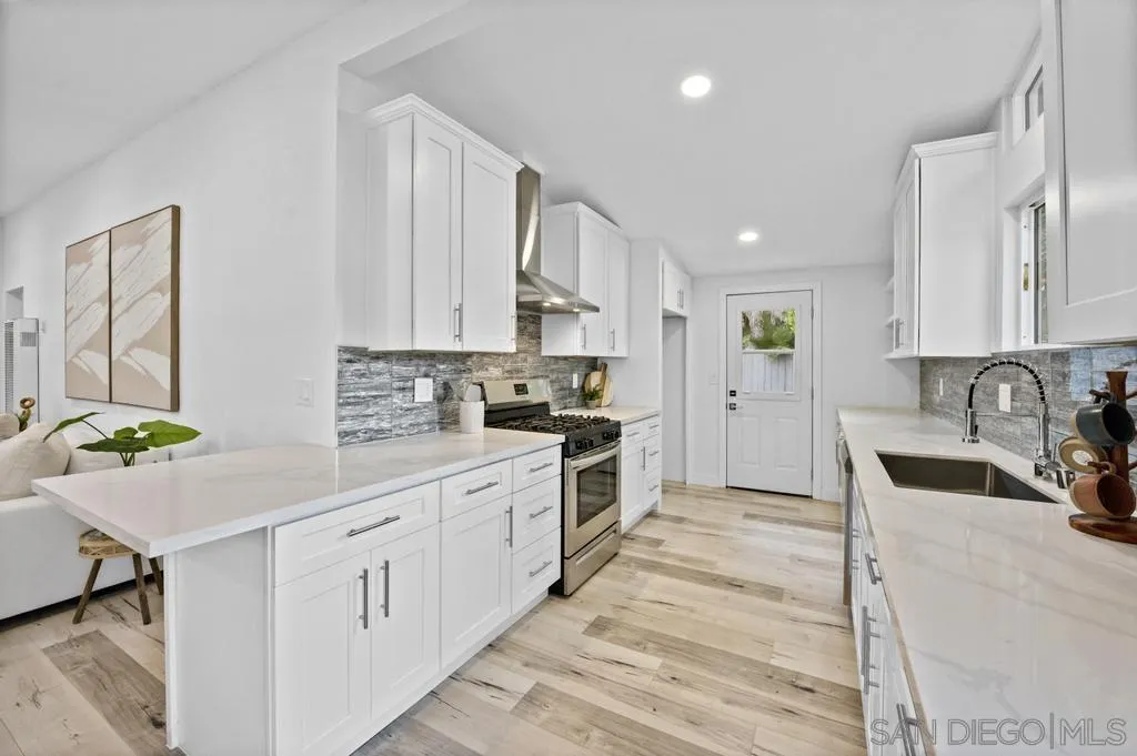 13746 Frame Road Poway, CA 92064 - Photo 5 of 35 a kitchen with a sink cabinets and window