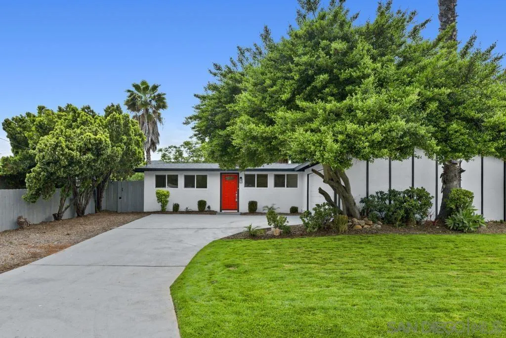 13746 Frame Road Poway, CA 92064 - Photo 10 of 35 a front view of house with yard and trees in the background