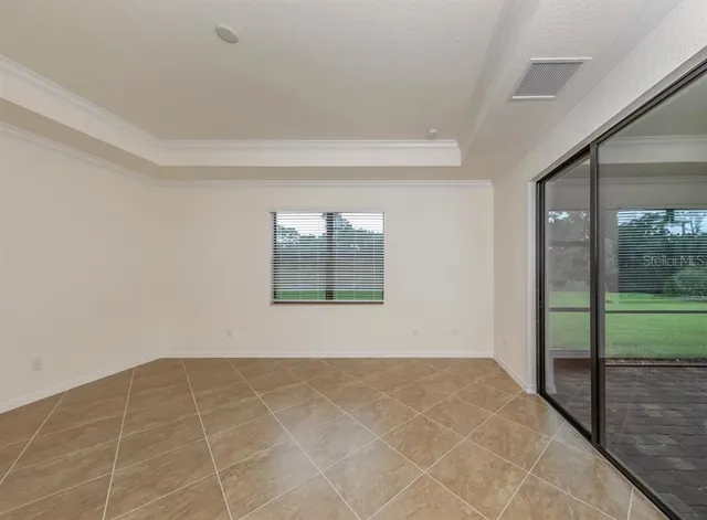 a view of an empty room and window