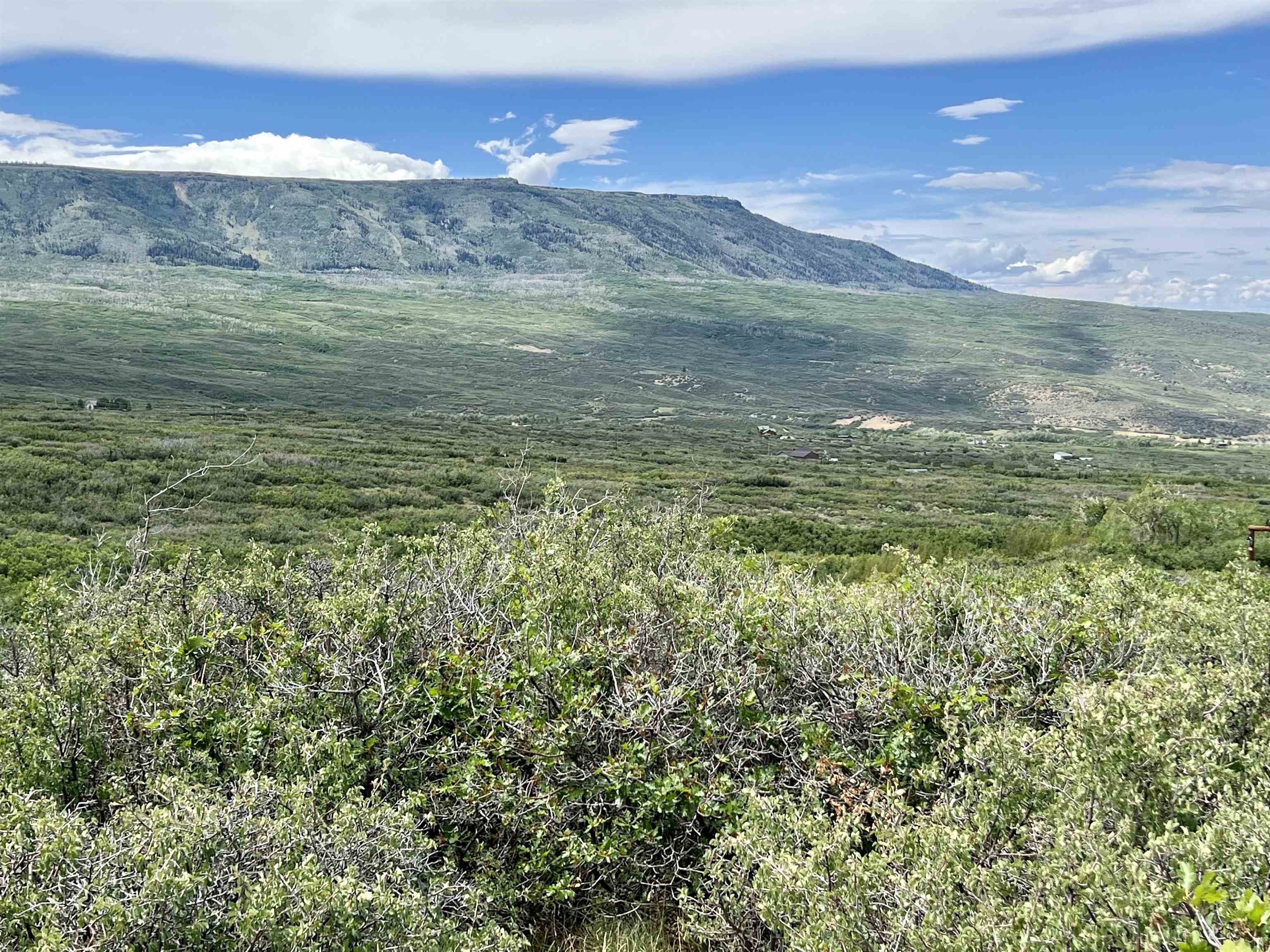 50106 Bear Run Drive Mesa, CO 81643 - Photo 4 of 18 a view of an ocean from a mountain