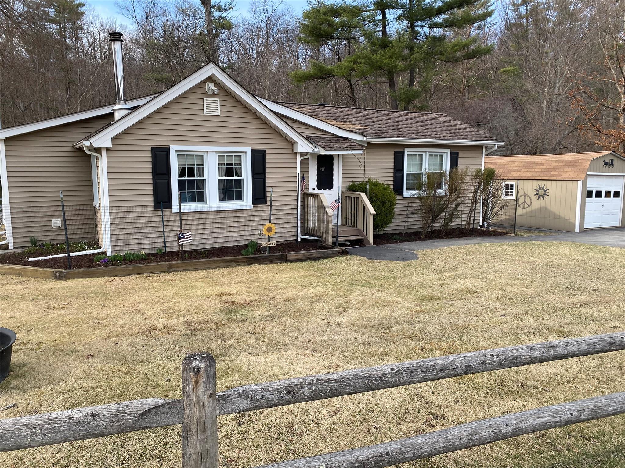 168 Prospect Road Monroe, NY 10950 - Photo 2 of 15 Ranch-style house featuring an outbuilding, a garage, and a front lawn