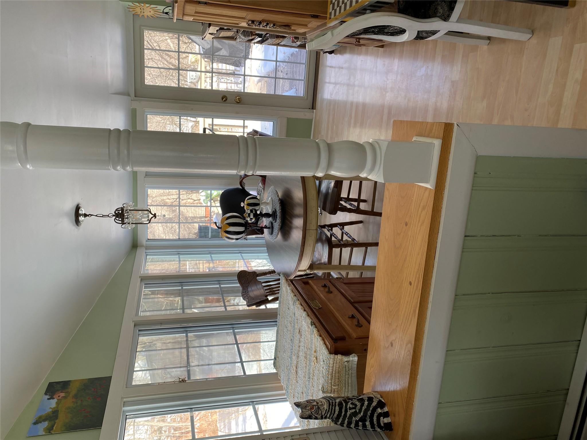 168 Prospect Road Monroe, NY 10950 - Photo 4 of 15 Dining room with decorative columns, lofted ceiling, and light wood-style floors