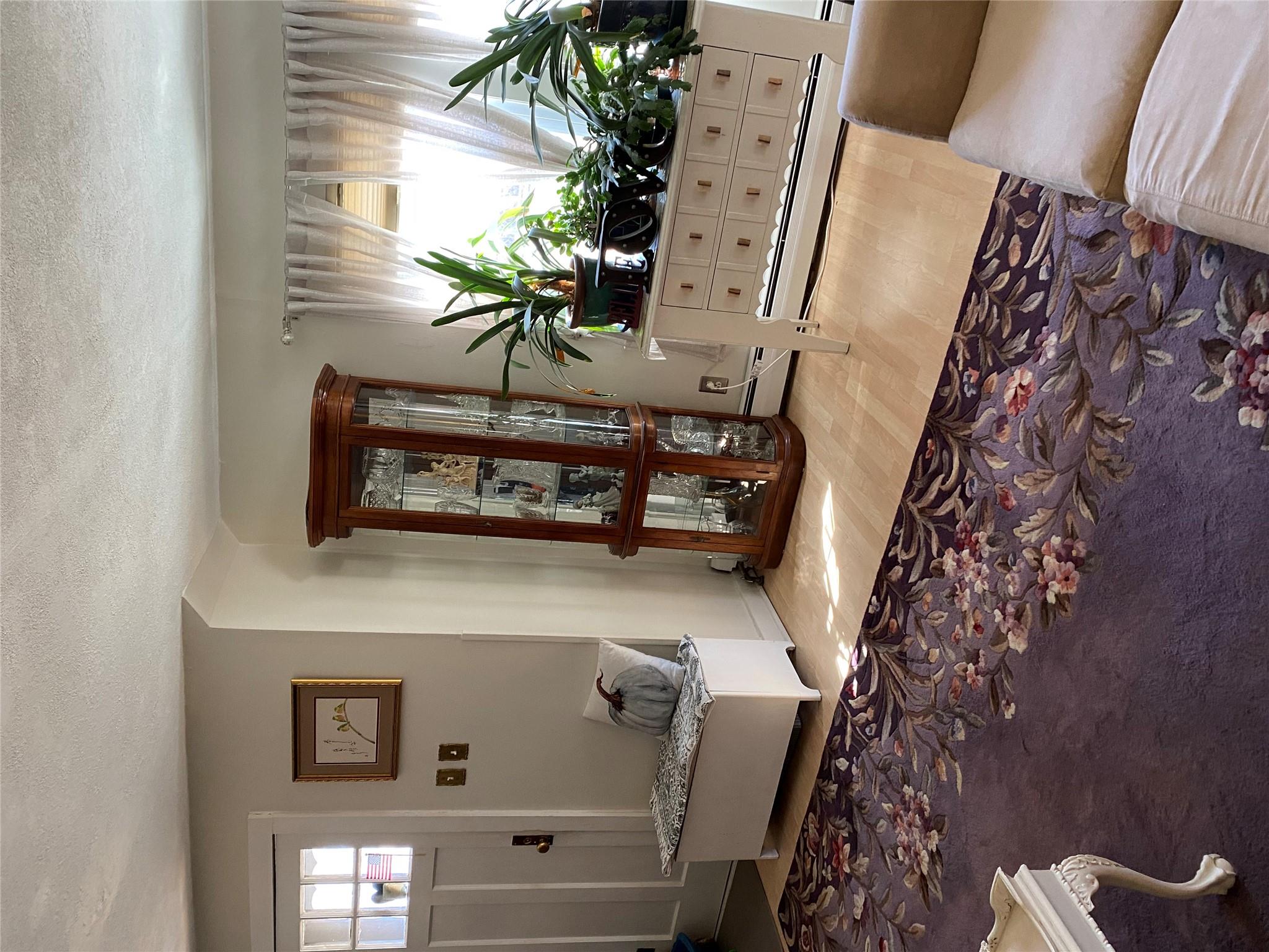 168 Prospect Road Monroe, NY 10950 - Photo 6 of 15 Unfurnished living room with light wood-style floors, a baseboard radiator, and a textured ceiling